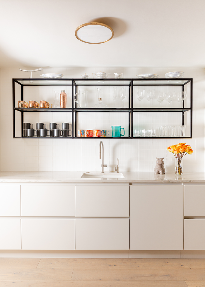 A well-organized scullery replaces the former kitchen. 