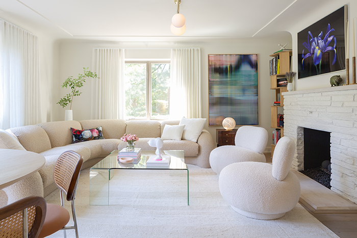 FAMILY AFFAIR The living room is a great space for family gatherings. The sofa and chairs are from Modern Love Furniture (www.modernlovefurniture.com).