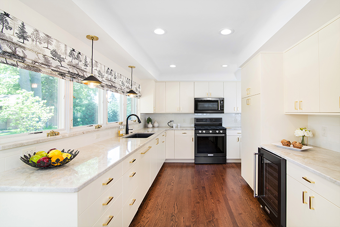 BETTER FLOW Studio Z Architecture reconfigured the kitchen for optimal workspace and storage.