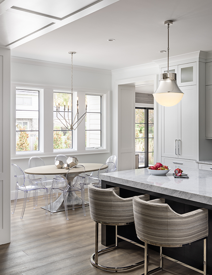 PRACTICAL & PRETTY Sunbrella-covered bar stools in the kitchen are chic but durable, says designer Jane Spencer, and can be spot-cleaned with soap and water — especially important in a house with younger children.